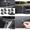 Interieurdecoraties auto accessoires mini -lijmlijmproducten opladerlijn elkaar klem hoofdtelefoon/USB -clip mobiele drop levering mobiele telefoons dhxiu