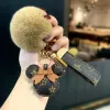 Keychains & Lanyards designer Designer keychain bear head leather fur ball pendant key chain bow car metal fashion personality creative cute 6EVC