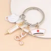 Key Rings Fashion Nurse Hat Stethoscope Syringe Mask Alloy Keychain Medical Tool Pendant Student Gift Souvenir Drop Delivery Smt0K