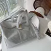 Duffel torbası gümüş kabartma tasarımcısı Duffle çanta erkek totes el bagaj deri çanta büyük çapraz vücut kılıf moda çantası