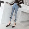 Dżinsy damskie S-xl Kobiet Summer Fashion Hollow Out Cross Pasp Bandage Pencil Pants Sexy 2023 Lace Up Hole długość cielęcia