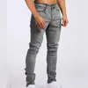 Jeans maschile magro elasticizza gamba strappata jeans azzurro per uomo