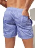 Shorts pour hommes Athleisure Cordes Poches Courir Bain de soleil Respirant Plage Gym Lettre Imprimé Boxer Mi Pantalon