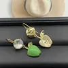 Merkontwerper miumiu oorbellen mode nieuwe kerstavond groen temperament kristal vol diamant earhook premium zoete oorbellen licht luxe accessoires sieraden