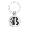 Nyckelringar Lanyards Ny Creative Keychain Man och Female Letter Boy Initial A B C D Glass Pendant Jewelry Friend Gift Drop Delivery SMTU0