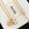 Varumärkesdesigner Miumiu Fashion Halsband Ny Super Fairy Asymmetric Gold Finish Crystal Love Diamond Inlaid Pendant CLAVICLE CHAIN ​​IS PERFEKT ACCEITORYS SMYCKE