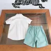 Traccetti da uomo Outfit Luxury Boys Kids Summer Designer per bambini Boy Short Short Short Shirt Set Fashion Half Shorts 2ps Suit