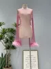 Podstawowe sukienki swobodne H80 S90 Kobiety seksowne kryształowe diamentowe pióra Bodycon puste z długim rękawem Mesh Swim Party Mini sukienka 230818