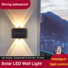 Facturer la lampe murale solaire extérieure étanche de haut en bas éclairage lumineux pour la clôture de jardin