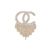9101New in stile intarsio intarsato per perle temperamento da donna Diamond Spilla oro e lettere d'argento Regalo di Natale Hit the Trend
