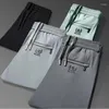 Pantaloni da uomo estate zip tasche per pantaloni della tuta traspirabili a secco rapido nylon casual pista di grandi dimensioni pantaloni sportivi dritti