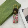 Designer Brand Keychain Key Chain Men Uomini di lusso Chiavi Donne Fashion Fashion Cuckle Borse in pelle fatte a mano Accessori a sospensione