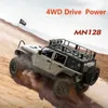 Diecast Model 1 12 Car MN128 Wranglers, поднимающиеся по удалению взрослой профессионал 2 4G 4WD Buggy со светодиодным светом Toy Gift 230818