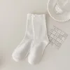 Femmes chaussettes printemps et automne solide noir blanc marron hommes général moyen polyvalent sport respirant coton