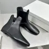 The Row Shoes Black Sheepskin Tornozelo Botas simples Botas de moda Designer Boots Shoes de fábrica para mulheres 35-40