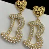 T GG Charm Vintage Classique Perle Boucles D'oreilles Femmes Plaqué Or 18 Carats Perle Lettres Creux Pendantes Coeur Cuivre Orné Oreille Stud Rétro Bijoux De Fête