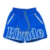 Pantalones cortos de diseñador Pantalones cortos de rhude Diseñadores de verano Moda Pantalones de playa Hombres Ropa de calle de alta calidad Rojo Azul Negro Pantalones morados para hombre sh324K