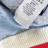 デザイナーキッズジッパーコートスプライシングデザインチャイルドジャケットサイズ100-150 cmファッショングリッドレター印刷長袖の赤ちゃんのアウトウェア8月18日