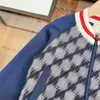 diseñador Niños cremallera Abrigos Diseño de empalme Chaqueta para niños Tamaño 100-150 CM Moda Impresión de letras en cuadrícula Manga larga Bebé Outwear Aug18