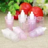 En gros 500 pcs/lot Mini 5 ml 10 ml vide pompe sans air bouteilles en plastique pression émulsion bouteille Lotion cosmétique emballage Wiwgn