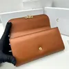 Designer de moda Carteiras de couro de luxo Triumphe Long Triumphe Cuir Crédito Titular Bolsa de bolsa Bolsa de embreagem Mulheres de bolsas de moeda zippadora com bolsa de pó de caixa original