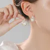 Nouvelles boucles d'oreilles en forme de flamme de perles incrustées de zircon avec des boucles d'oreilles de luxe légères à sens avancé Boucles d'oreilles de style petit parfum pour femmes à la mode Aiguille en argent