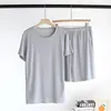 Pijama de verano para mujer, pijama para hombre, conjuntos de pijama informales, pantalones cortos y camisetas cómodos de Modal, ropa de casa para hombre