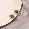 2023 Neue Smaragd-drehbare grüne Zirkon-Ohrringe mit hoher Qualität und elegantem Stil, kleine Publikumsohrringe, einfache Ohrringe