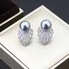 Diamond studded personalized pearl earrings for women with a highends enseex aggeratedea rringsfas hionableand lux urioustem peramentearr ingsands ilv erneed le