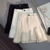 Nieregularna marszczona spódnica Spring High talia Linia szczupła biała dżinsowa damska anty ekspozycja