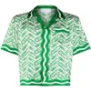 Casablanca-ss 2023 New Ping Pong Classic chemises pour hommes imprimé vert prairie unisexe lâche chemise en soie britannique designer à manches courtes tee335u