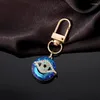 Keychains Zircon Bling Hollow Blue Evil Eye Keychain Keyring Women Couple Retro Round Crystal Turkish Bag Car Airpods Box Accessory