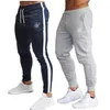 Pantaloni maschili maschi di seta sik di alta qualità pantaloni in poliestere di fitness di formazione casual formazione quotidianamente fitness sport jogging pantaloni 230822