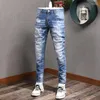 Jeans masculino Moda de moda de rua retro azul claro trecho slim slim rasgou remendado designer vintage elástico calças de jeans hombre