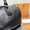 Duffle Bag Seyahat Bag Bagaj Tasarımcı Duffles Bags Kadın Tasarımcılar Çanta Moda Klasik Kapasite Büyük Kapasite Siyah Renk Bagajı 50cm