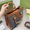 Vintage -Umhängetasche Bambus Handtasche große Kapazität Einkaufsbeutel Buchstabe Leinwand Leder Travel Handtaschen Geldbeutel Klappe Magnetische Schnalle Abnehmbare Gurt Totes