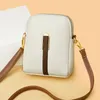 Kvällspåsar 2023 Fashion Real Cowhide Girls Purse Phone Pouch äkta läder axel kvinna minimalistisk fast färg mini crossbody väska