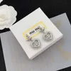 En iyi tasarımcı Miumiu Küpe Moda Yeni Işık Lüks Love Love Diamond Bow Knot Heart Heart İnci Küpeler Sevgililer Günü Hediye Kalitesi Işık Lüks Takı Aksesuarları