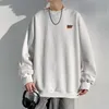 Solid round neck jacquard casual sweaters spring and autumn trends fashionable men's breathable pendant versatile clothing