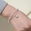 Braccialetti di fascino Bracciale di perle a doppio strato coreano semplice braccialetto per donne per donne in temperamento dolce gioielli a sospensione regalo regalo