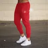 Pantaloni maschili maschi di seta sik di alta qualità pantaloni in poliestere di fitness di formazione casual formazione quotidianamente fitness sport jogging pantaloni 230822