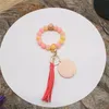 Bracelet à file à gland bracelet Keilleur de couverture alimentaire des perles de silicone bracelets féminins girl key ring bracelet df068
