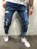 Jeans maschile cotone miscela skinny hole strappato denim per uomini hip hop slim fit stretwear badge badge in angoscia blu pantaloni a matita 230821