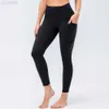 2023 Desginer Al Yoga Fitness Pantalons Taille haute pour femmes Abdominale Hanche Lift Pantalon de sport ajusté Poches latérales en forme de pêche Pantalon de hanche
