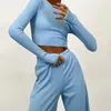 Twee stuk broek voor dames Solid Color Yoga Set Past Fitting Long Sleeve Top met comfortabele broek Stijlvol casual Sports gebreide hardlooppak