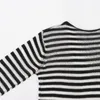 Suéteres de mujer 2023 verano mujer ramio mezclado cuello redondo rayas hombros caídos manga larga ligeramente transparente suéter Casual