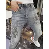 Мужские джинсы весенняя осень роскошная корейская мода вымыта полированная джинсовая принт винтажная буровая ковбойская уличная одежда стройная карандашная брюки 230822