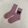 Tasarımcı Çorap Tatlı ve Sevimli Orta Kaldır Socks G-Leter İşaretli Örgü Bowknot Siyah Beyaz Penik Kısa Pamuk Çorap Kadınlar için 8T44