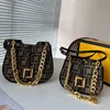 Womens Designer Bag Fancy Sadel Shoulder Påsar Topphandväskor Lyxiga flickor Totes äkta läderkedjekopplingar med presentförpackning