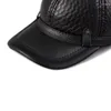 Casquettes de baseball mâle 2023 printemps/hiver en cuir véritable Protection de la tête en cuir de vachette Baseball noir Plaid gaufrage chapeau réglable pour homme